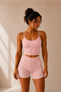 Brassière et short Flowline rose clair portés